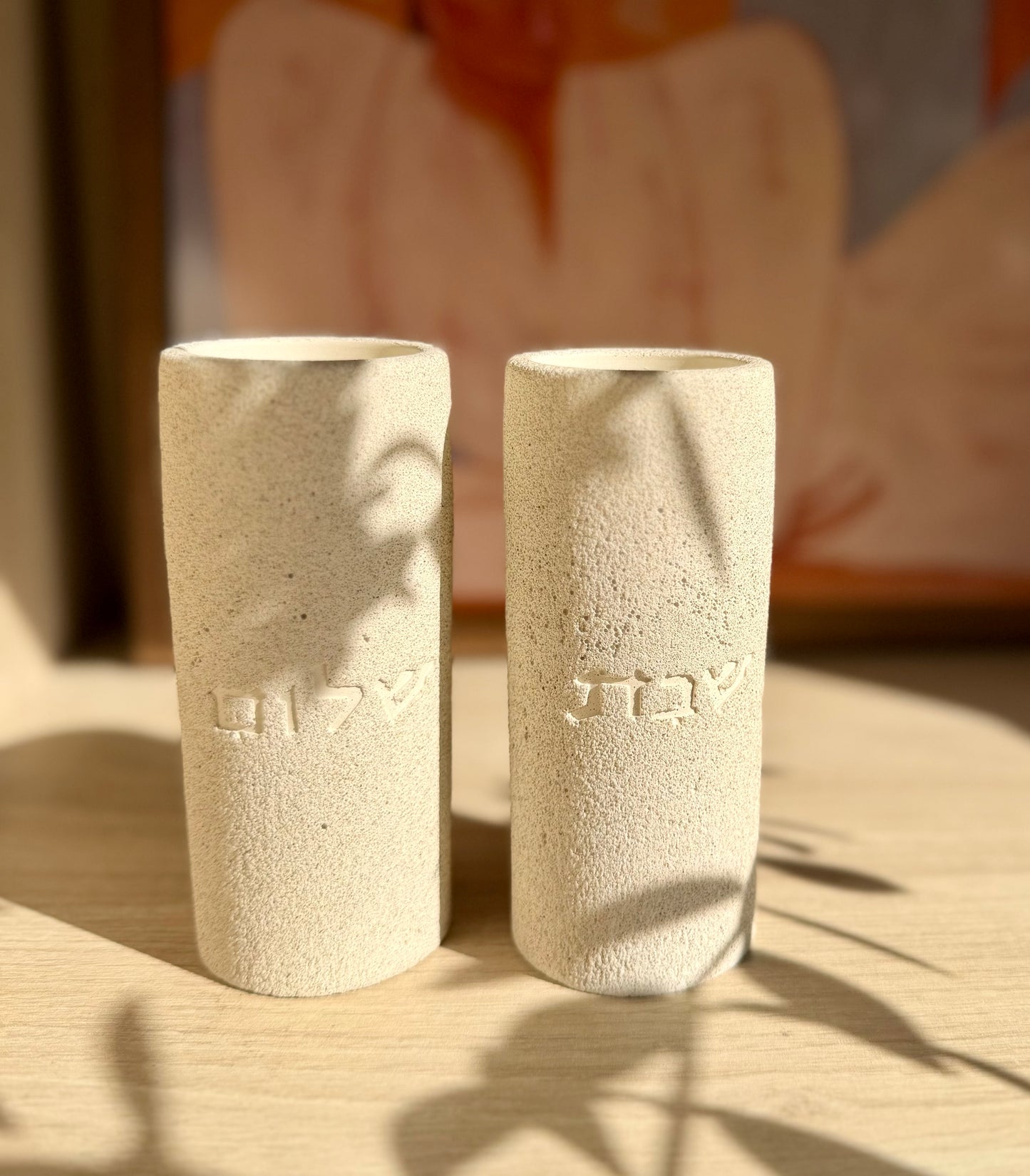 The Menuha Shabbat Candle Holders in Portland stone - fine stone finish